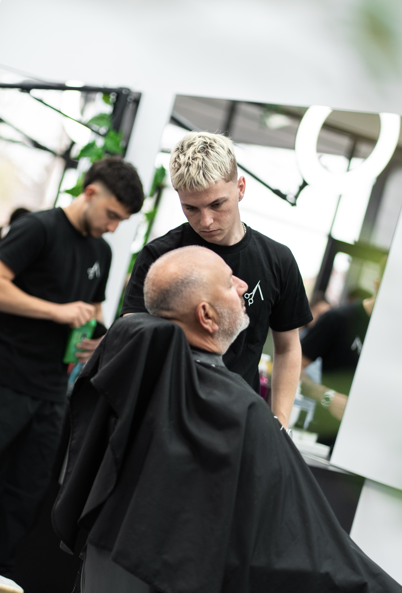 Jackson, Barber at Aidan Cuts Barbershop